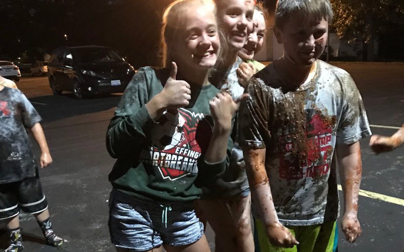 Centenary youth smiling after a food fight